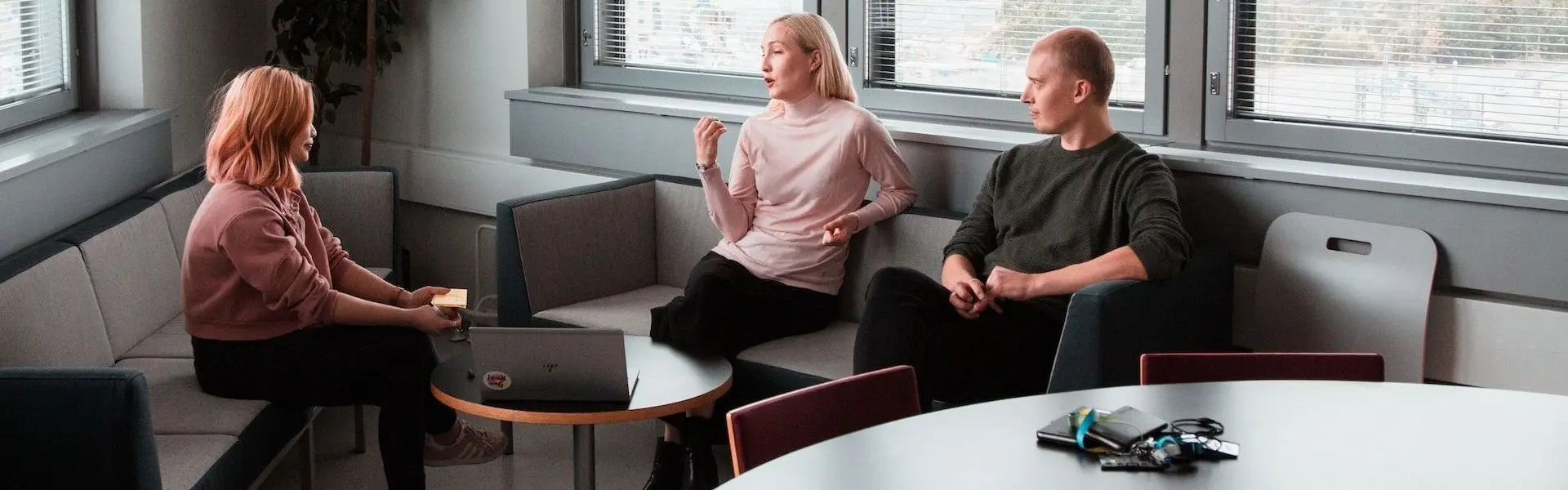 Workers sitting in an office having a mental health discussion