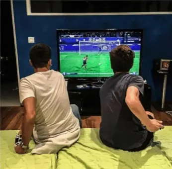 Two men playing video games